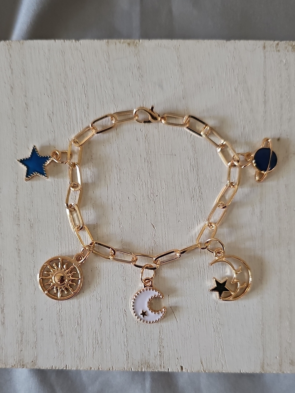 Gold-Tone Celestial Charm Bracelet with Blue Accents